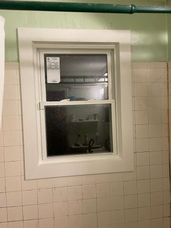 New window in shower with PVC trim